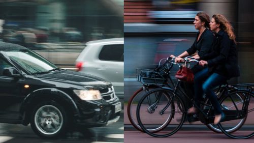 Fahrrad und Auto im Straßenverkehr